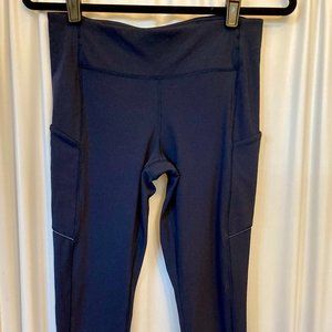 Lululemon navy tights in size 8, 27" long NWOT